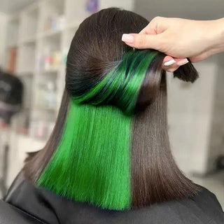 Green hair dye on customer hair 